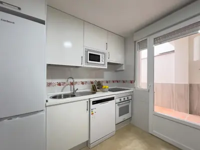 Una cocina o zona de cocina en TAYP San Marcos 106