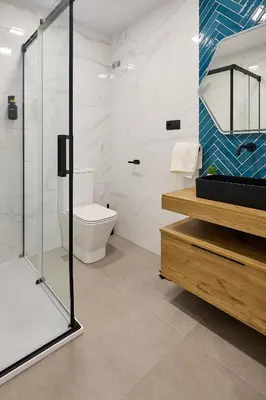 Un baño de Apartamentos Plasencia Bambu