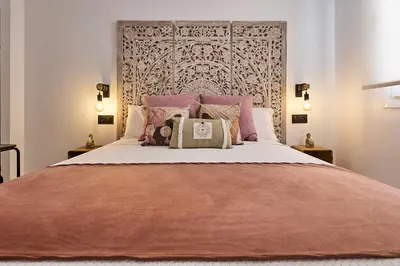 Cama o camas de una habitación en Apartamentos Plasencia Bambu