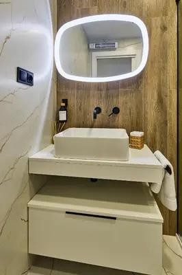 Un baño de Apartamentos Plasencia Bambu