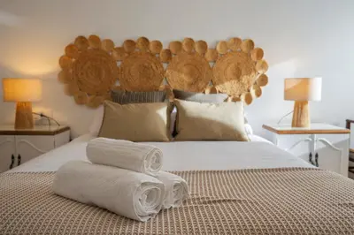 Cama o camas de una habitación en Caleros 34 Centro Histórico con patio by keyhom