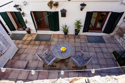 Un balcón o terraza de Caleros 34 Centro Histórico con patio by keyhom