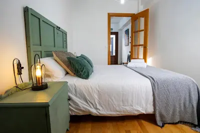 Cama o camas de una habitación en Caleros 34 Centro Histórico con patio by keyhom