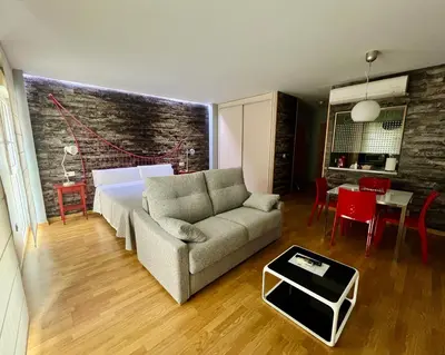 Zona de estar de Apartamentos Suites Capitolio
