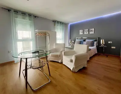 Zona de estar de Apartamentos Suites Capitolio