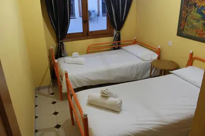 Cama o camas de una habitación en El Laurel
