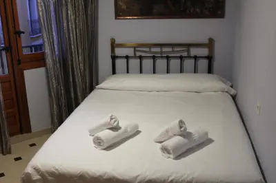 Cama o camas de una habitación en El Laurel