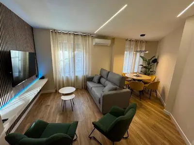 Una televisión o centro de entretenimiento en Premium Plaza de la Fuente