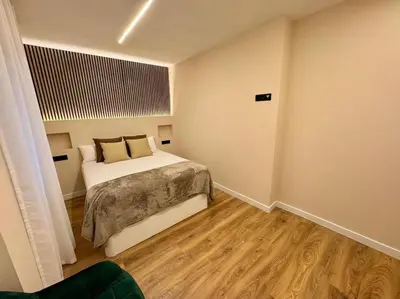 Cama o camas de una habitación en Premium Plaza de la Fuente