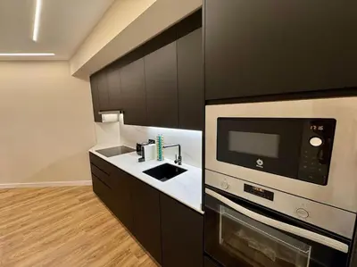 Una cocina o zona de cocina en Premium Plaza de la Fuente