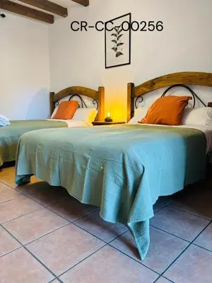Cama o camas de una habitación en Casa Rural Puerto del Emperador