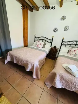Cama o camas de una habitación en Casa Rural Puerto del Emperador