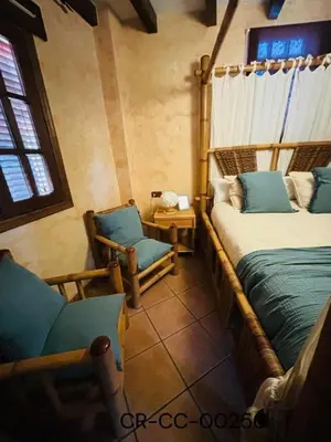 Cama o camas de una habitación en Casa Rural Puerto del Emperador