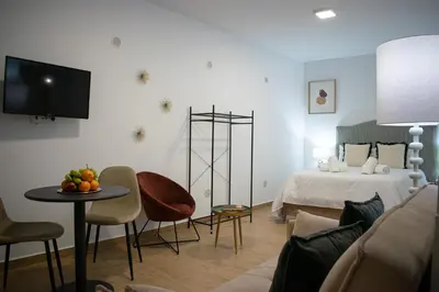 Cama o camas de una habitación en Apartamento Turístico Diocles