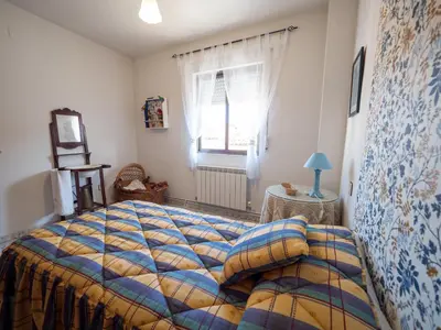 Cama o camas de una habitación en Casa rural Regajo Lobos
