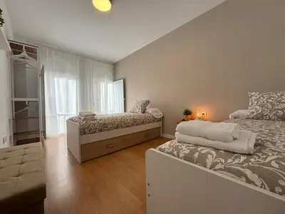 Cama o camas de una habitación en Apartamento turístico Clavero 3