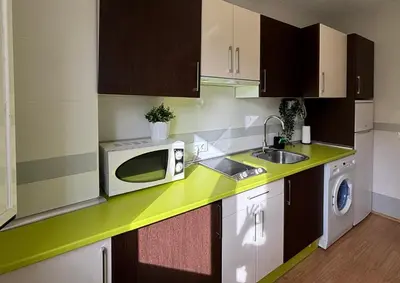 Una cocina o zona de cocina en Apartamento turístico Clavero 3