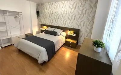 Cama o camas de una habitación en Apartamento turístico Clavero 3
