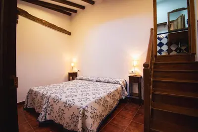 Cama o camas de una habitación en Apartamentos El Pozo1