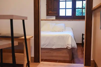 Cama o camas de una habitación en Apartamentos El Pozo 2