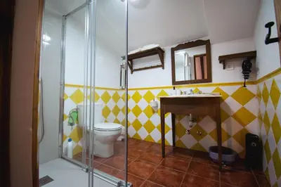 Un baño de Apartamentos El Pozo 2