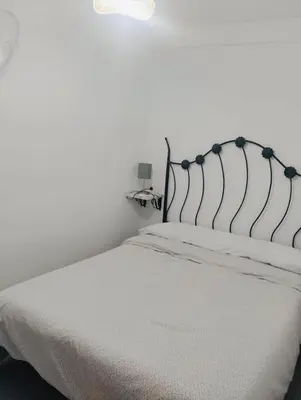 Cama o camas de una habitación en Apartamento Turístico la Casa escondida