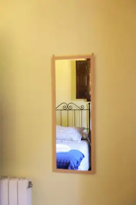 Cama o camas de una habitación en El arroyo del valle
