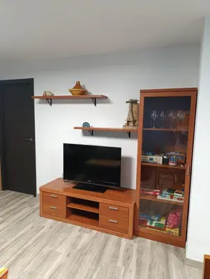 Una televisión o centro de entretenimiento en El Hogar del Castañar - Alojamiento en El Tiemblo