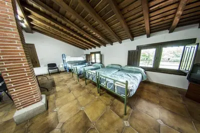 Cama o camas de una habitación en Hotel Rural La Majada