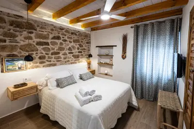 Cama o camas de una habitación en Casa Rural Doña Pepita