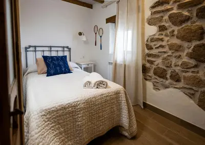 Cama o camas de una habitación en Casa Rural Doña Pepita