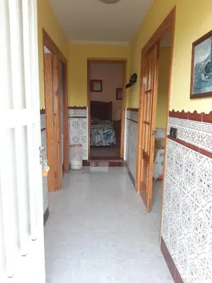 Una televisión o centro de entretenimiento en Casa Rural El Maragato