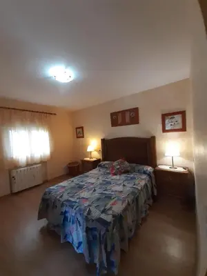Cama o camas de una habitación en Casa Rural El Maragato