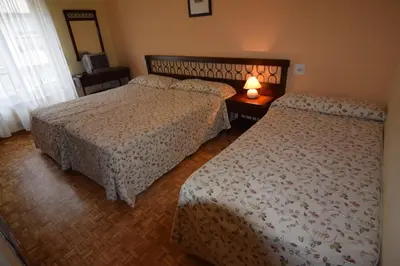 Cama o camas de una habitación en Hostal Blazquez Sanchez
