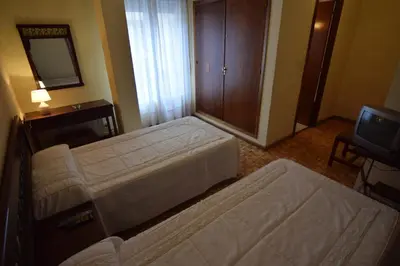 Cama o camas de una habitación en Hostal Blazquez Sanchez