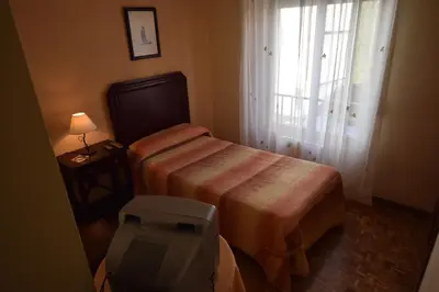 Cama o camas de una habitación en Hostal Blazquez Sanchez