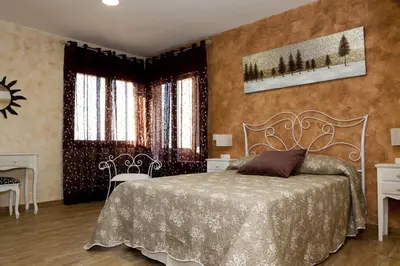 Cama o camas de una habitación en Casa Rural La Canchalera