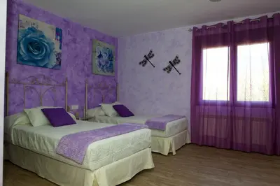 Cama o camas de una habitación en Casa Rural La Canchalera
