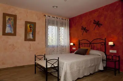 Cama o camas de una habitación en Casa Rural La Canchalera