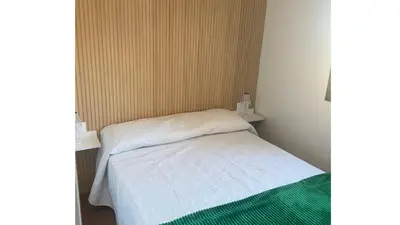 Cama o camas de una habitación en El Descanso de Eros