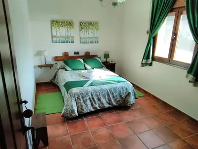 Cama o camas de una habitación en EL cordel casa rural