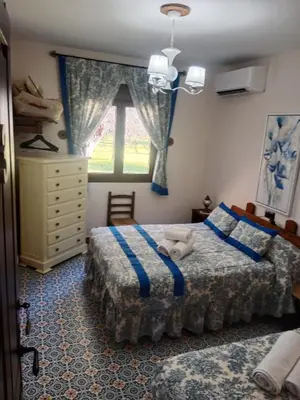 Cama o camas de una habitación en EL cordel casa rural