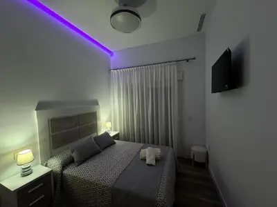 Cama o camas de una habitación en Casa Rural El Lucero Extremeño