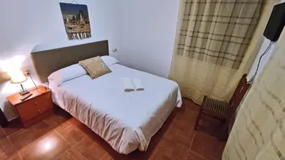 Cama o camas de una habitación en Casa de Simona