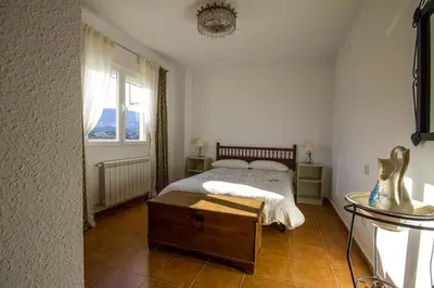Cama o camas de una habitación en AT Las Viñuelas 17