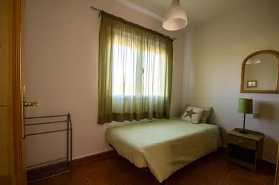 Cama o camas de una habitación en AT Las Viñuelas 17