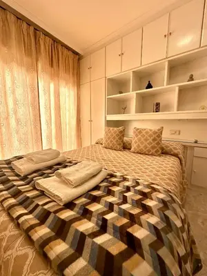 Cama o camas de una habitación en A T La plaza Alto