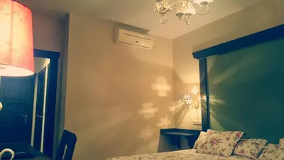 Cama o camas de una habitación en El Huésped del Sevillano AR
