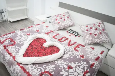 Cama o camas de una habitación en Hostal Goyesco Plaza