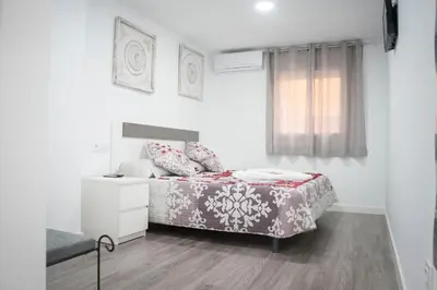 Cama o camas de una habitación en Hostal Goyesco Plaza